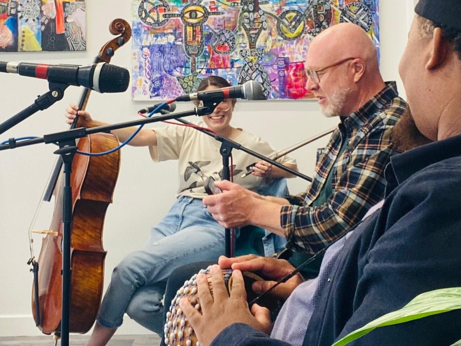 Higher Ground Collective rehearsing — cello, flute, percussion and voices